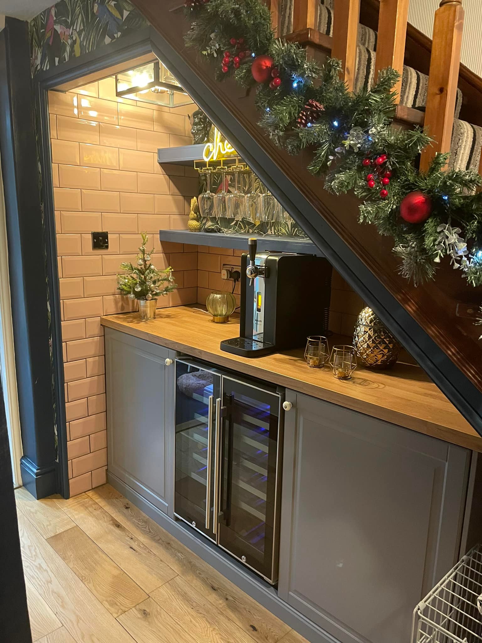 IKEA under stairs bar setup with kitchen base units and wooden worktop